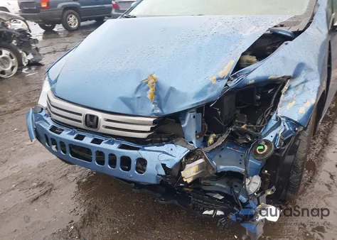 2010 Honda Insight Lx z USA, uszkodzony, nr VIN JHMZE2H55AS013674